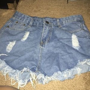 Distressed denim shorts